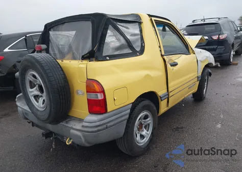 2003 Chevrolet Tracker z USA, uszkodzony, nr VIN 2CNBE18C736912372